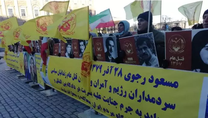 Iranian Resistance supporters gather in front of Stockholm court