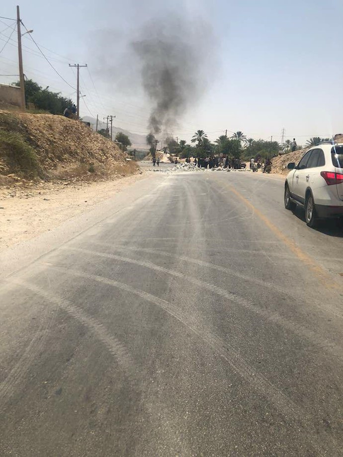 Kazerun residents clash with security forces after they block the road