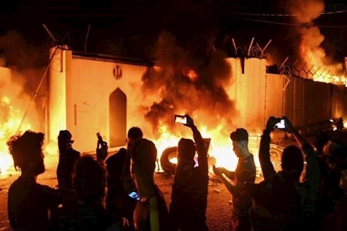 Iraqi protesters torching the Iranian regime’s consulate in Najaf