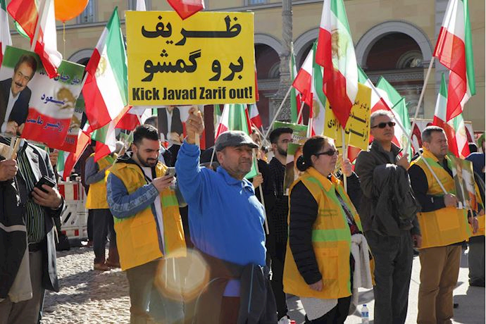 Supporters of Iranian opposition Peoples Mojahedin Organization of Iran (PMOI/MEK) rallying in Munich, chanting “Zarif get lost!”