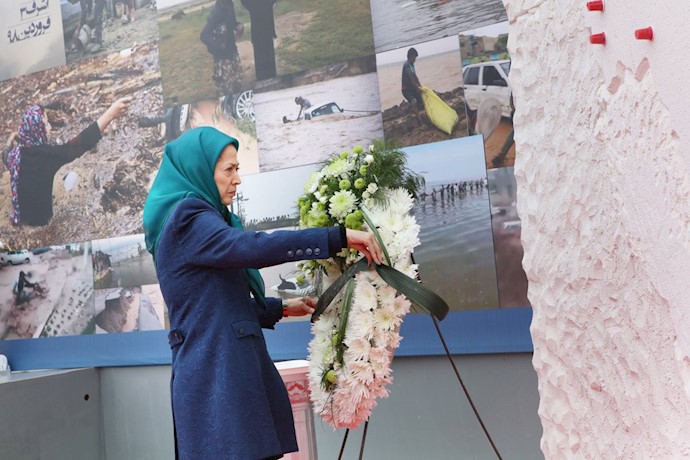 Placing flowers and paying respect to the victims of the flood disaster in Iran