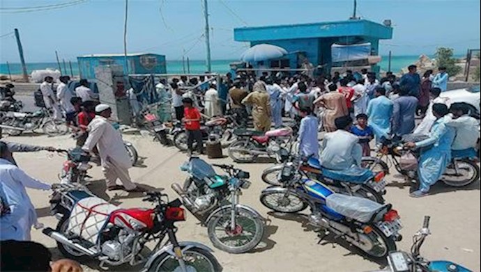 Fishermen and locals holding a protest rally at a port in Chabahar, Sistan & Baluchistan Province, southeast Iran