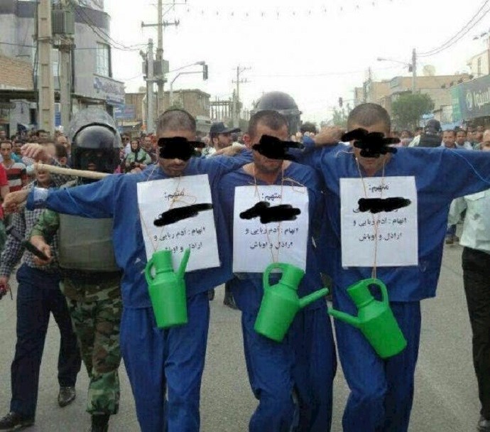 Regime security forces, known as the SSF, parade a young man in humiliating manner—Iran Regime security forces, known as the SSF, parade a young man in humiliating manner—Iran