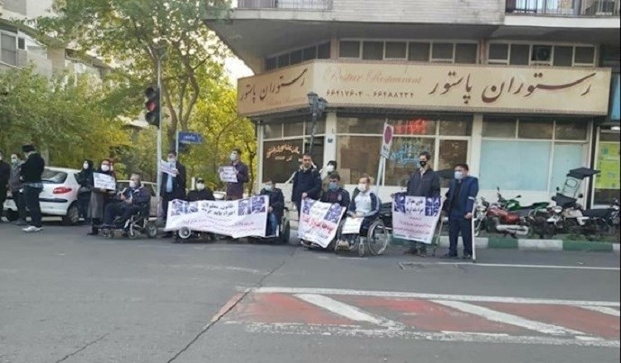 Protest rally by disabled people in front of the Presidential Palace, Tehran