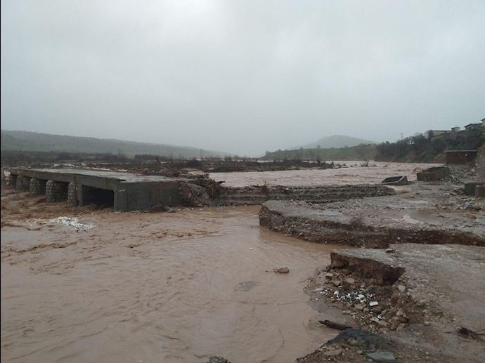 Bridge in Cham Divan village near the city of Chegeni suffers severe damage due to rising floodwaters
