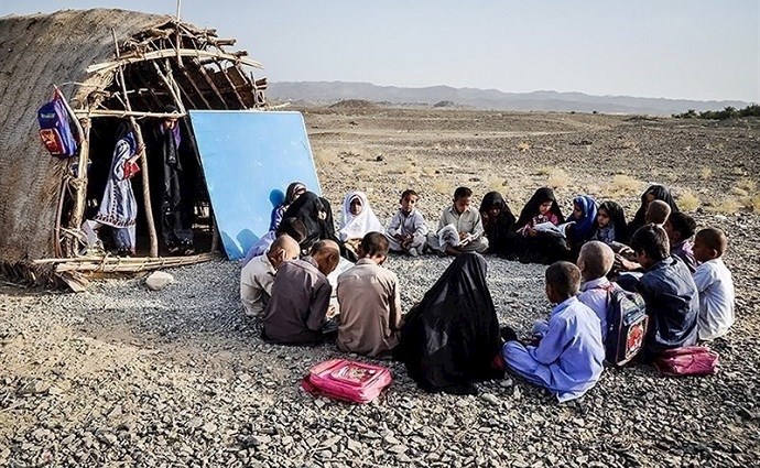 Children study in capers and tents in Sistan & Baluchistan province, southeast Iran