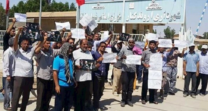 Municipal workers protest in the city of Aravnd Kenar, southwest Iran 
