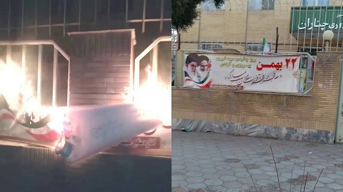Chenaran- Torching a large banner with images of Khomeini and Khamenei, related to the regime’s ceremonies on the occasion of the 1979 revolution- February 10, 2021 Chenaran- Torching a large banner with images of Khomeini and Khamenei, related to the regime’s ceremonies on the occasion of the 1979 revolution- February 10, 2021